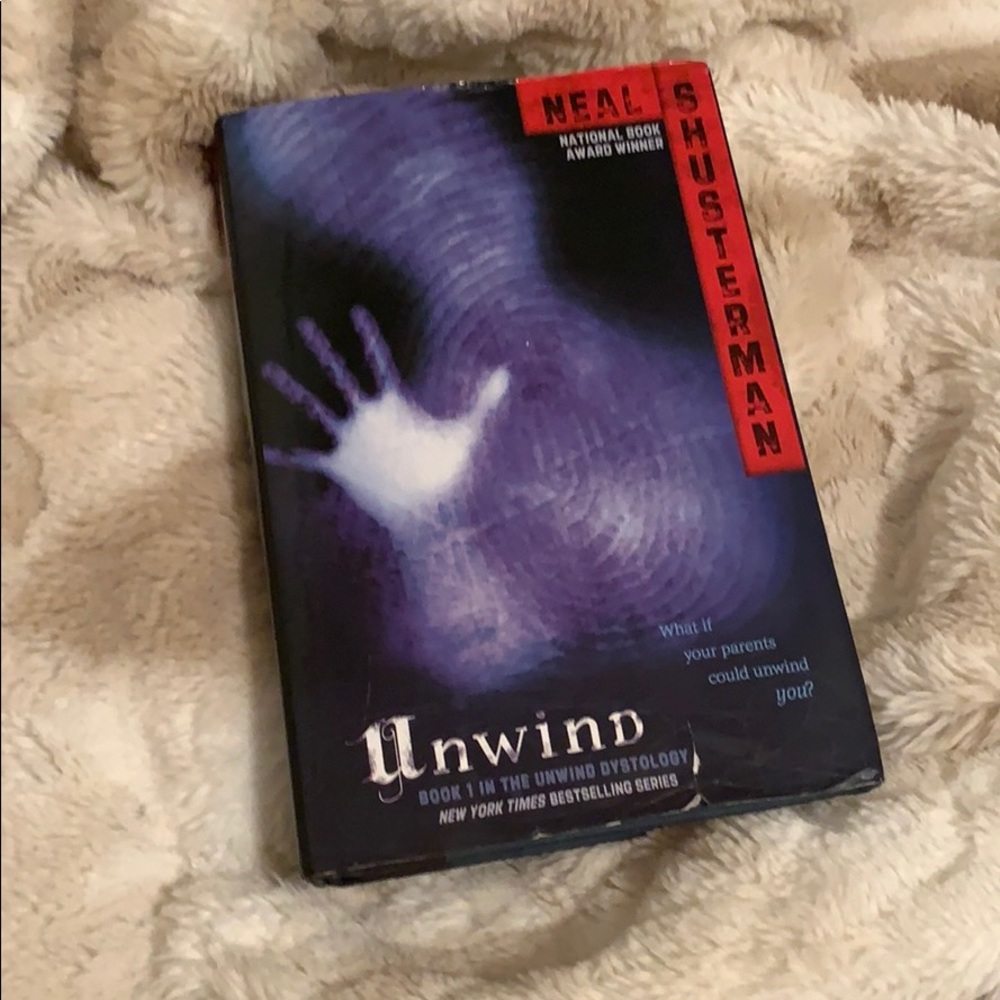hardcover copy of book unwind by Neal Shusterman
